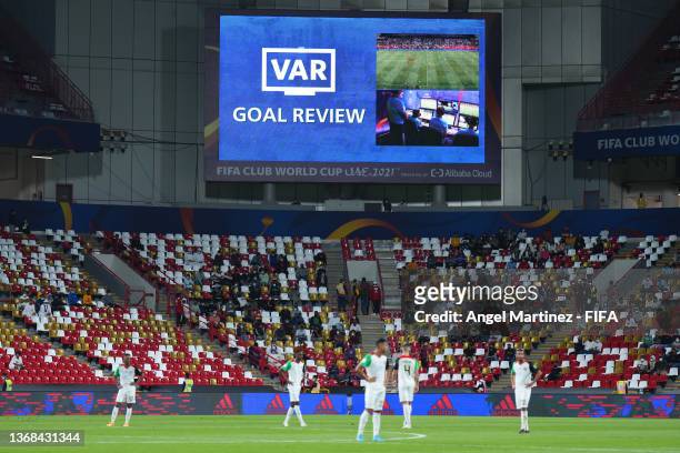 The LED screen informs of a VAR review following a goal scored by Zayed Al Ameri of Al Jazira Club which was later disallowed during the FIFA Club...