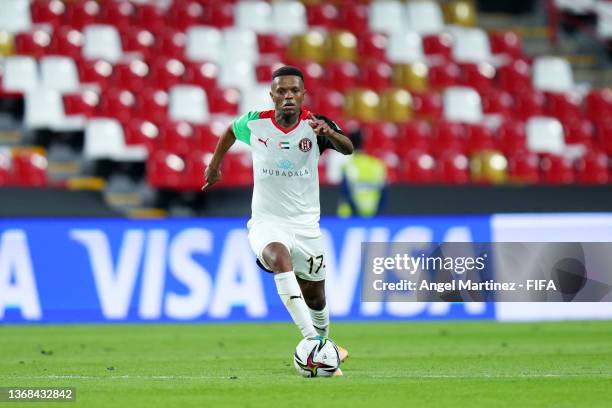 Thulani Serero of Al Jazira Club runs with the ball during the FIFA Club World Cup UAE 2021 1st Round match between Al Jazira Club and AS Pirae at...