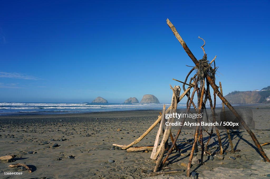 Rockaway Beach,Oregon,Scenic view of beach against clear blue sky