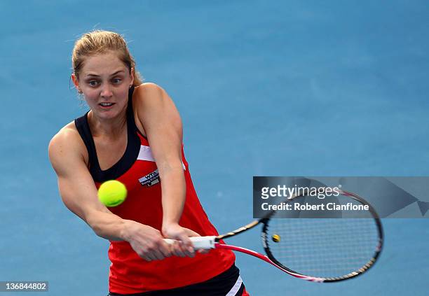 Anna Chakvetadze of Russia returns a shot to Shahar Peer of Israel during day five of the 2012 Hobart International at Domain Tennis Centre on...
