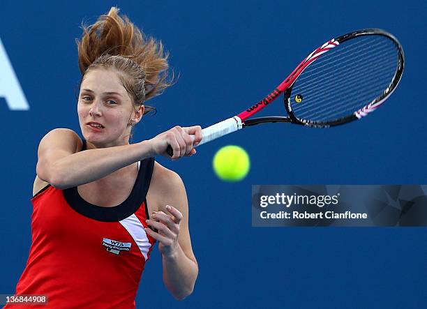 Anna Chakvetadze of Russia returns a shot to Shahar Peer of Israel during day five of the 2012 Hobart International at Domain Tennis Centre on...