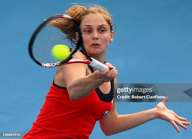 Anna Chakvetadze of Russia returns a shot to Shahar Peer of Israel during day five of the 2012 Hobart International at Domain Tennis Centre on...