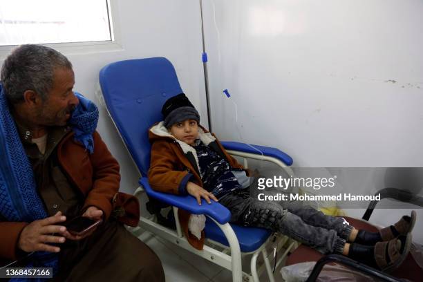Young Yemeni patient with cancer is seen inside a medical center as they receive treatment on International Cancer Day on February 04, 2022 in...