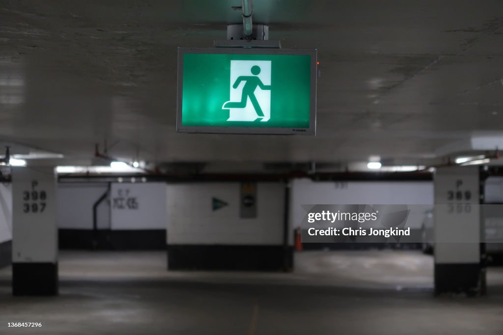 Exit Ramp Sign Green Green Emergency Exit Sign In Parking Garage High-Res Stock Photo ...