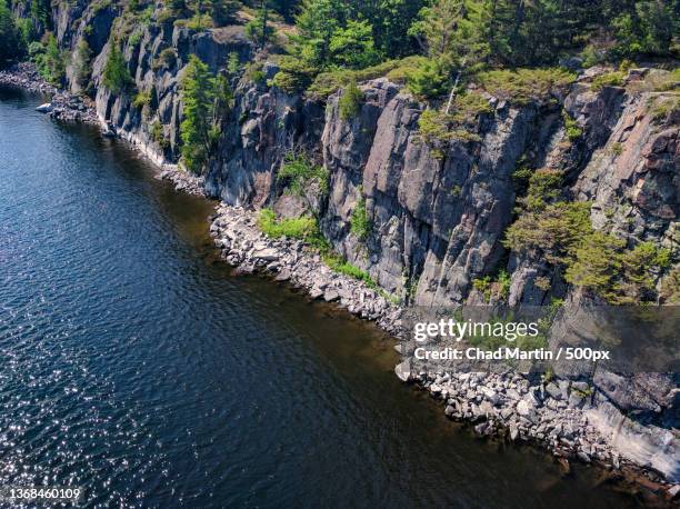 high angle view of river amidst trees,killarney,ontario,canada - sudbury stock pictures, royalty-free photos & images