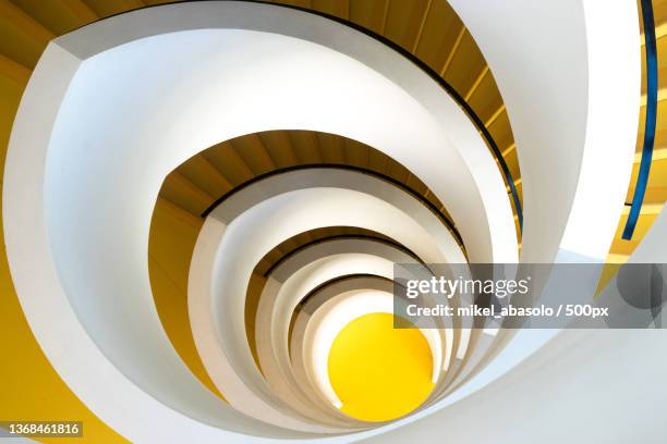 directly below shot of spiral staircase,lyon,france - spiral staircase fotografías e imágenes de stock