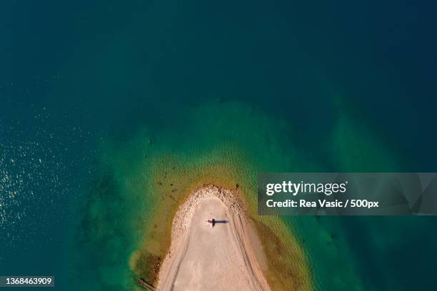 drone photography of seaside and boat on the open blue sea in summer,tivat,montenegro - montenegro photos et images de collection