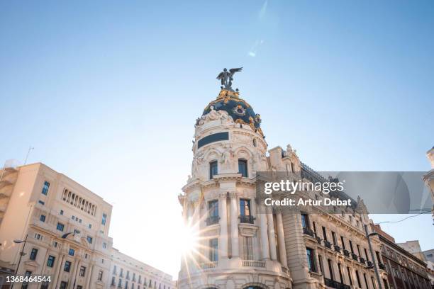 the metropolis famous monument in the center of madrid city. spain. - madrid landmark stock pictures, royalty-free photos & images