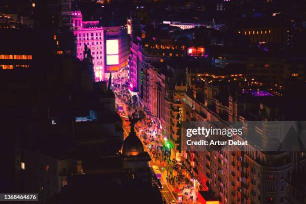 night view of the gran via street in madrid city. spain. - gran vía madrid foto e immagini stock