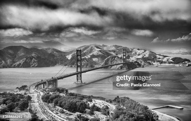 san francisco golden gate bridge, aerial view from helicopter on a clear sunny day. - northern california stock pictures, royalty-free photos & images