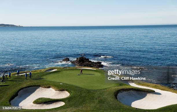 The seventh green is prepared for the first round of the AT&T Pebble Beach Pro-Am at Pebble Beach Golf Links on February 03, 2022 in Pebble Beach,...