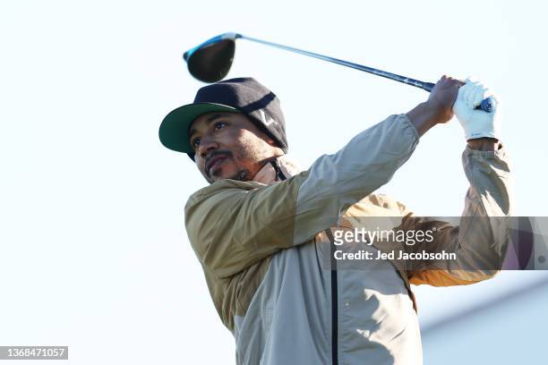 Player Mookie Betts plays his shot from the first tee during the first round of the AT&T Pebble Beach Pro-Am at Monterey Peninsula Country Club on...