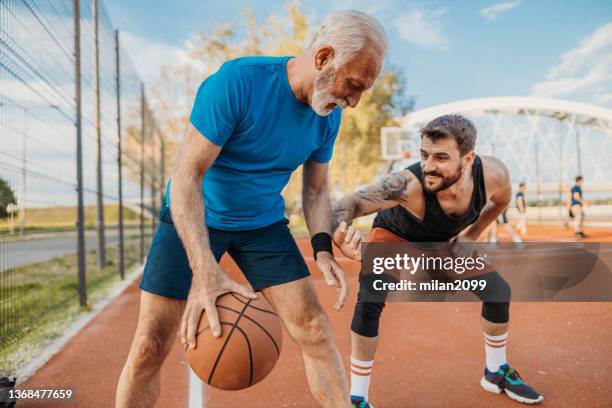 basketball time - match basket stock pictures, royalty-free photos & images