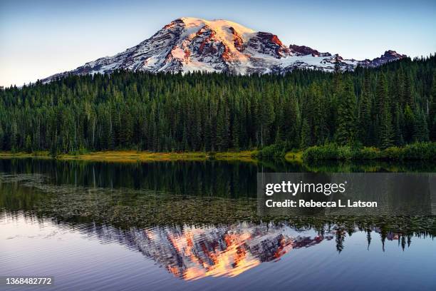 sunrise over reflection lakes - lake reflection stock pictures, royalty-free photos & images