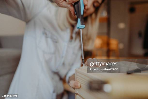working with tools - screwdriver stock pictures, royalty-free photos & images
