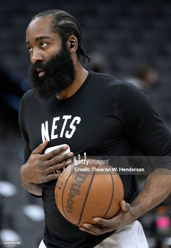 James Reed Nets James Harden of the Brooklyn Nets on the court warming up prior to ...