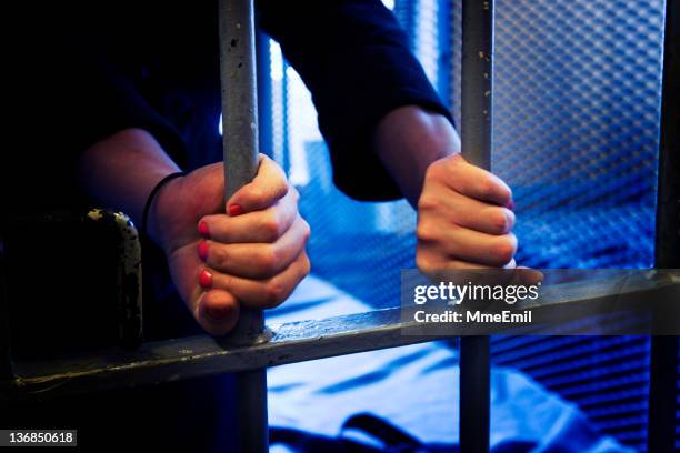 prisoner and woman - tralies stockfoto's en -beelden