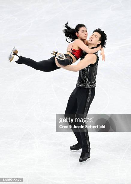 Shiyue Wang and Xinyu Liu of Team China skate in the Ice Dance Rhythm Dance Team Event during the Beijing 2022 Winter Olympic Games at Capital Indoor...