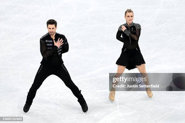 Madison Hubbell and Zachary Donohue of Team United States skate in the Ice Dance Rhythm Dance Team Event during the Beijing 2022 Winter Olympic Games...