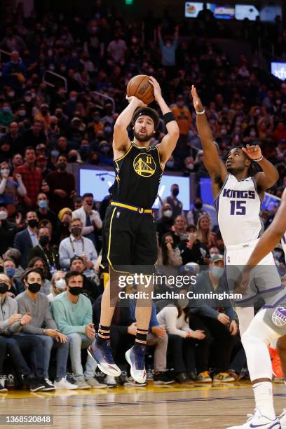 Klay Thompson of the Golden State Warriors makes a three point shot in the second half against the Sacramento Kings at Chase Center on February 03,...