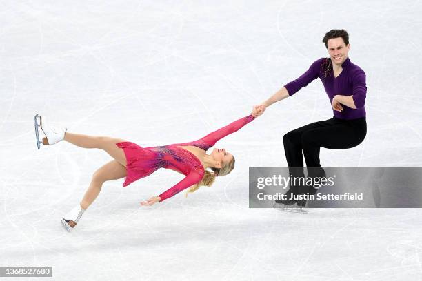 Kirsten Moore-Towers and Michael Marinaro of Team Canada skate in the Pair Skating Short Program Team Event during the Beijing 2022 Winter Olympic...