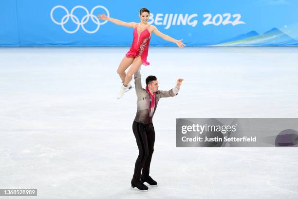 Anastasia Mishina and Aleksandr Galliamov of Team ROC skate in the Pair Skating Short Program Team Event during the Beijing 2022 Winter Olympic Games...