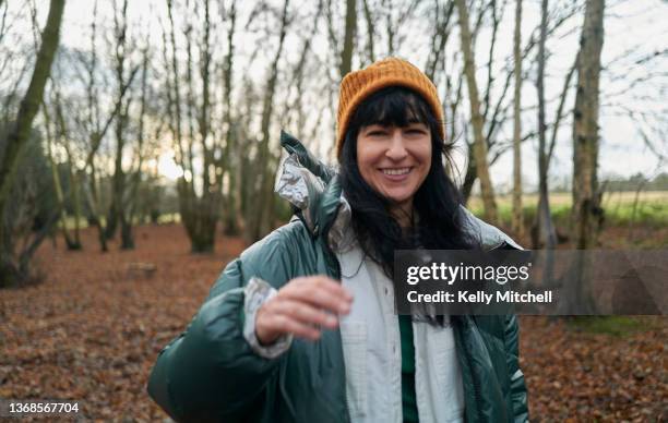 a country walk in winter - woman on walking in countryside stock pictures, royalty-free photos & images