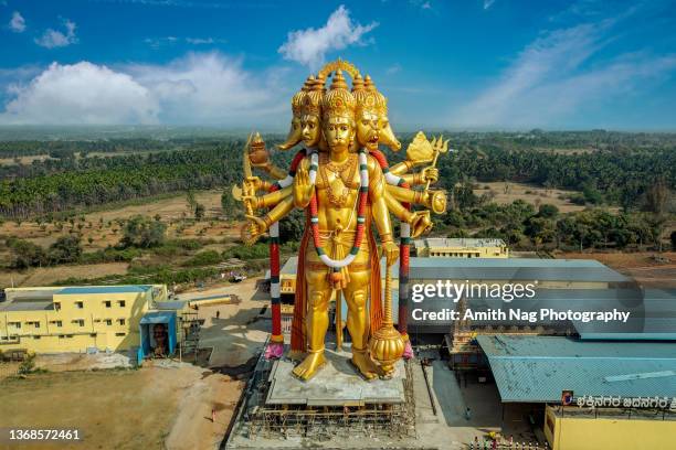 bidanagere hanuman statue - gold statue stock pictures, royalty-free photos & images