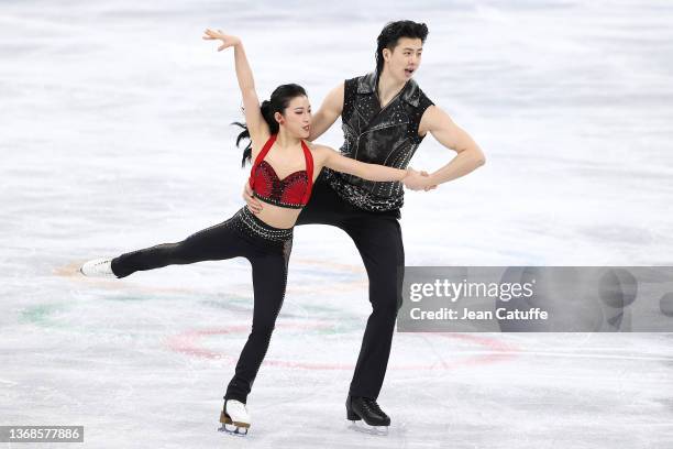 Shiyue Wang and Xinyu Liu of China skate in the Ice Dance Rhythm Dance Team Event during the Beijing 2022 Winter Olympic Games at Capital Indoor...