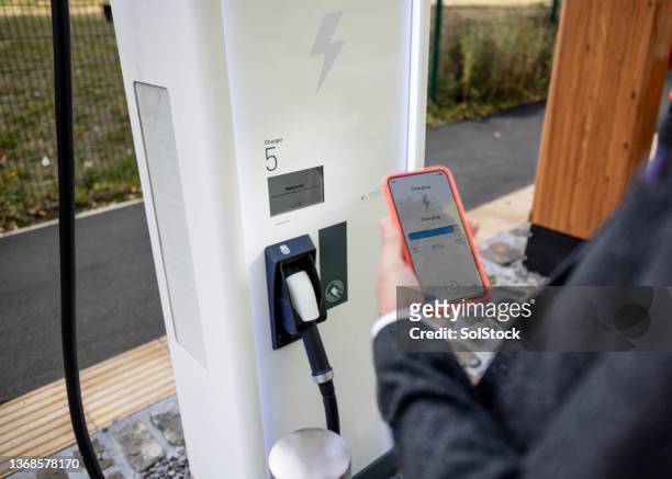 checking charge status - bollard stock pictures, royalty-free photos & images