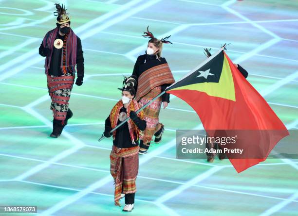 Flag bearer Yohan Goncalves Goutt of Team Timor-Leste carries their flag during the Opening Ceremony of the Beijing 2022 Winter Olympics at the...