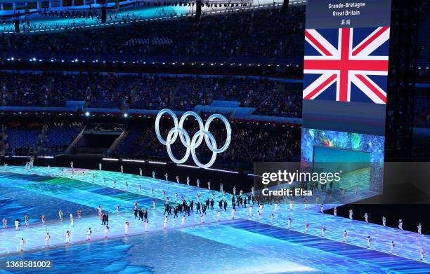 Flag bearers Eve Muirhead and Dave Ryding of Team Great Britain carry their flag during the Opening Ceremony of the Beijing 2022 Winter Olympics at...