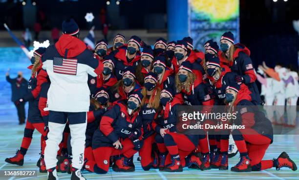 Members of Team United States pose for a photograph during the Opening Ceremony of the Beijing 2022 Winter Olympics at the Beijing National Stadium...