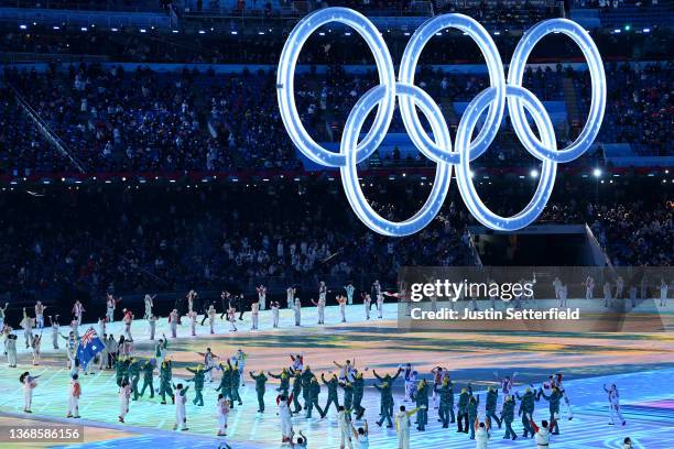 Flag bearers Brendan Kerry and Laura Peel of Team Australia carry their flag during the Opening Ceremony of the Beijing 2022 Winter Olympics at the...