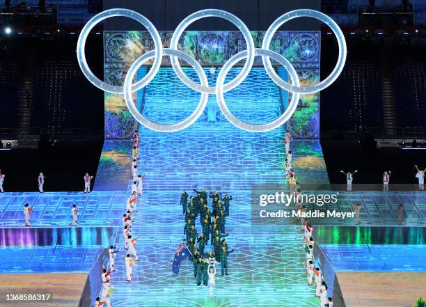 Flag bearers Brendan Kerry and Laura Peel of Team Australia carry their flag during the Opening Ceremony of the Beijing 2022 Winter Olympics at the...