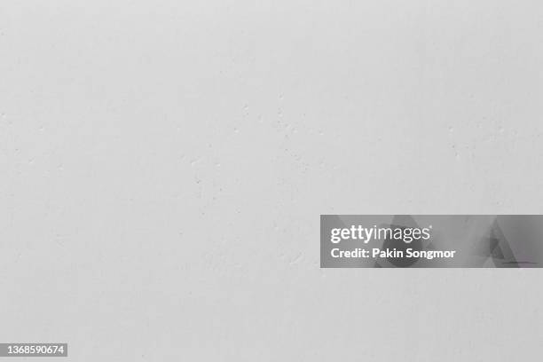 white colored eco-recycled kraft paper sheet texture was used to create the background. - man in suit white background stock-fotos und bilder