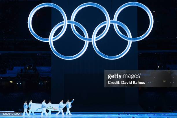 Zhihuan Luo, Hui Zhang, Jiajun Li, Xue Shen, Xiaopeng Han and Hong Zhang carry the IOC Flag during the Opening Ceremony of the Beijing 2022 Winter...