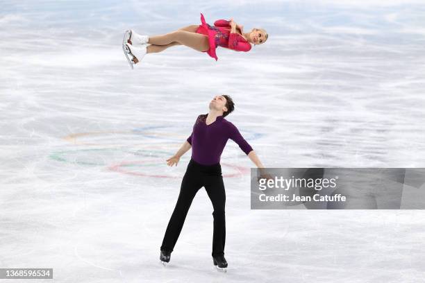 Kirsten Moore-Towers and Michael Marinaro of Canada skate in the Pair Skating Short Program Team Event during the Beijing 2022 Winter Olympic Games...