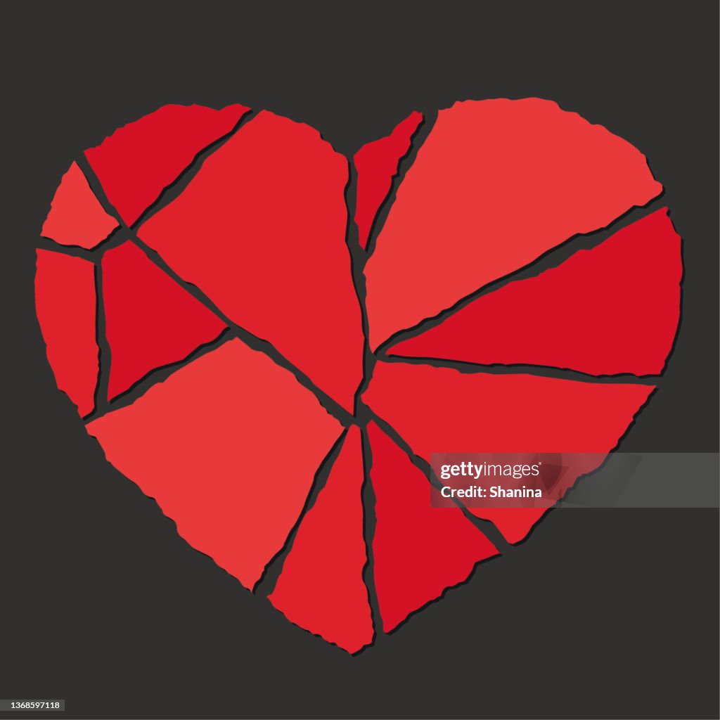 Broken heart - red torn papers - black background