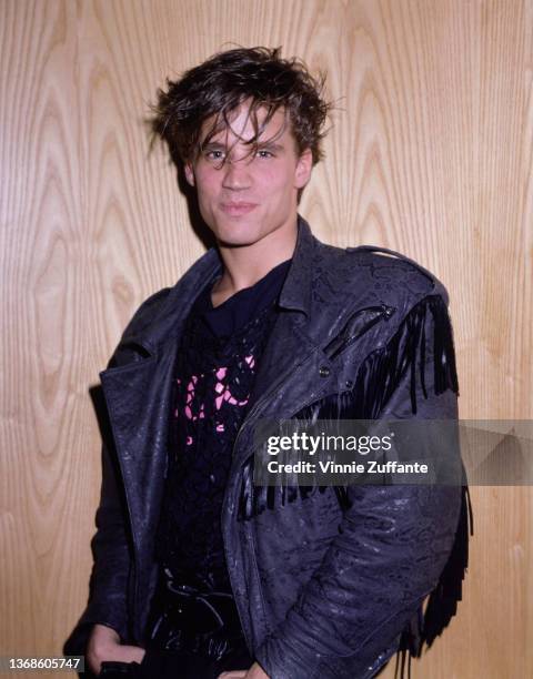 American actor and model Paul Lekakis backstage at Private Eyes, a nightclub in New York City, New York, 10th March 1987.