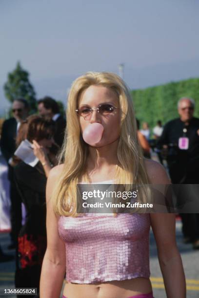 American singer, songwriter and musician Coley McCabe blowing a bubble gum bubble at the 35th Annual Academy of Country Music Awards, held at the...