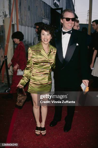 American actress Lauren Tom and American actor, musician and comedian Michael McKean attend the California Fashion Industry Friends of AIDS Project...