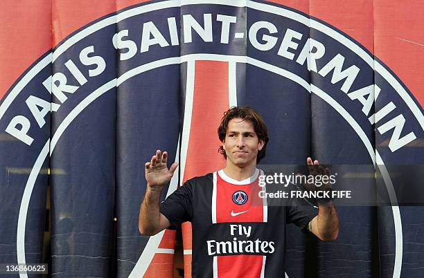 Paris Saint-Germain's newly recruited Brazilian defender Maxwell poses after a press conference on January 12, 2012 at the Parc des Princes in Paris....