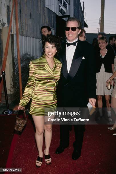 American actress Lauren Tom and American actor, musician and comedian Michael McKean attend the California Fashion Industry Friends of AIDS Project...