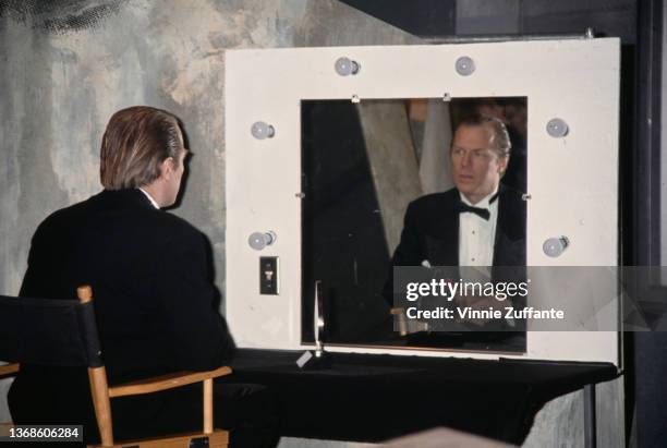 American actor, musician and comedian Michael McKean backstage, reflected in a dressing room mirror, at the 15th Annual CableACE Awards, held at...