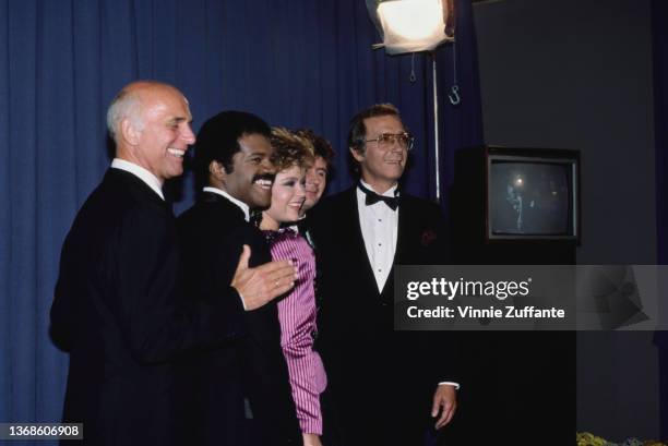 American actor Gavin MacLeod , American actor Ted Lange, American actress Jill Whelan, American actor Fred Grandy, and American actor Bernie Kopell,...
