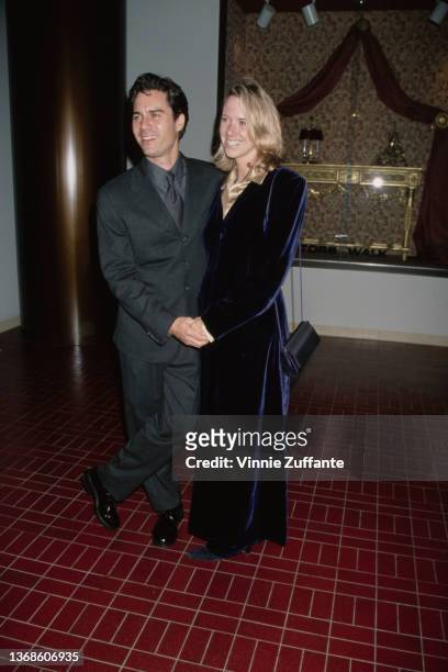 Canadian television director Janet Holden and her husband, Canadian-American actor Eric McCormack attend the 1998 Divine Design Gala, held at the...