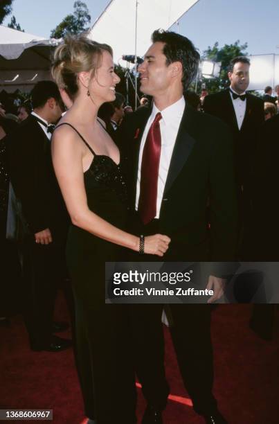 Canadian television director Janet Holden and her husband, Canadian-American actor Eric McCormack attend the 51st Annual Primetime Emmy Awards, held...
