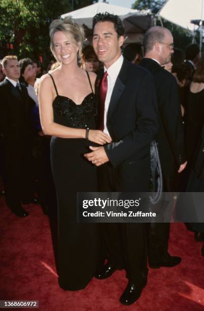 Canadian television director Janet Holden and her husband, Canadian-American actor Eric McCormack attend the 51st Annual Primetime Emmy Awards, held...