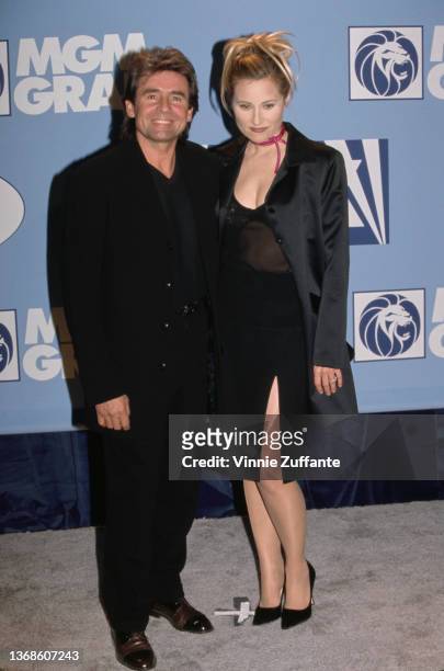 British singer and actor Davy Jones and American actress Maureen McCormick attend the 9th Annual Billboard Music Awards, held at the MGM Grand Hotel...